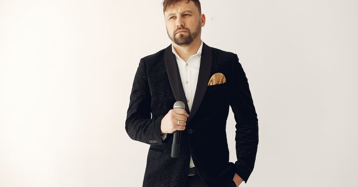 Should using VGA output be degrading performance and framerate? - Stylish serious male singer or anchorman taking microphone Should using VGA output be degrading performance and framerate? - Stylish serious male singer or anchorman taking microphone