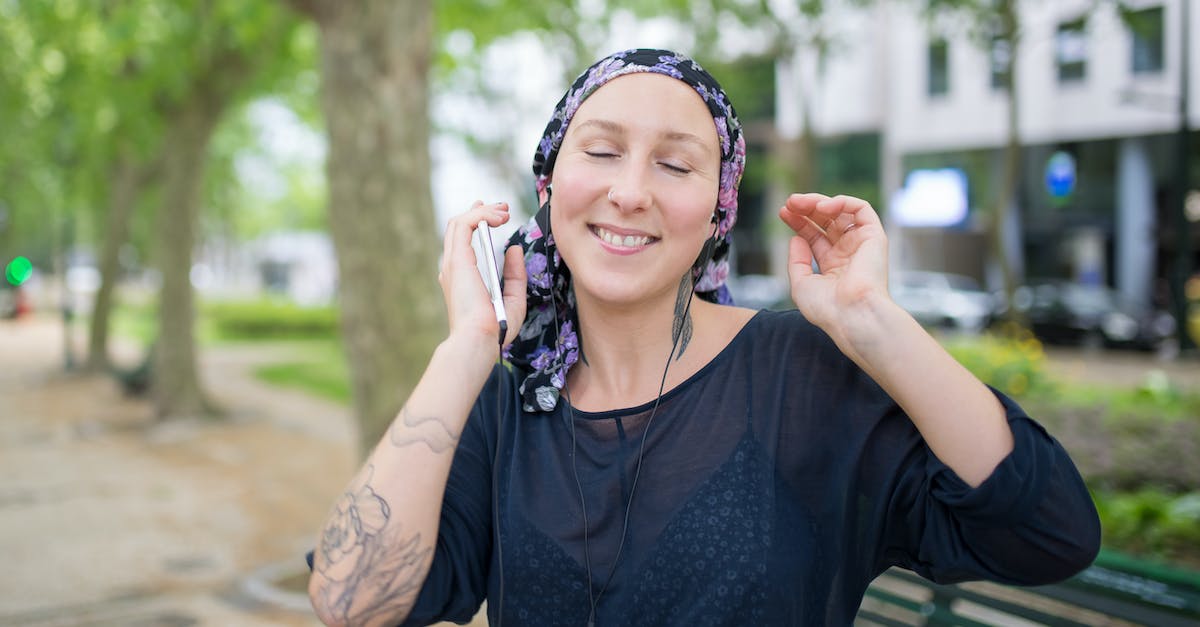 Should you go on every crash recovery mission? - Woman in Blue Long Sleeve Shirt Wearing Black and Purple Floral Headscarf