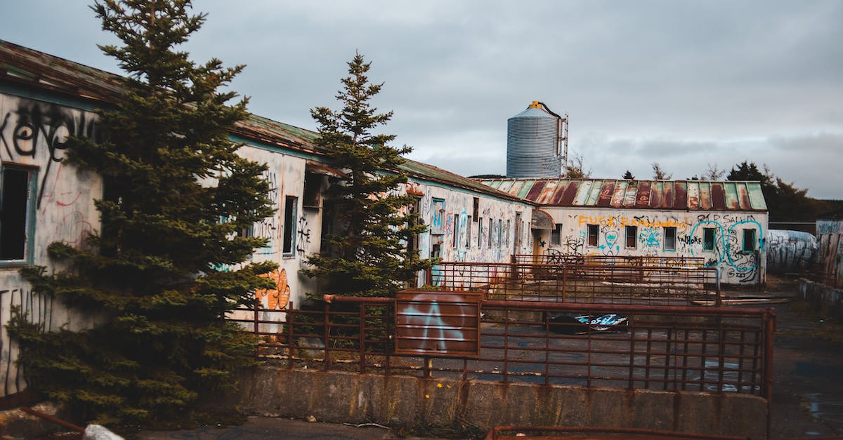 Should you let the minions destroy the towers? - Abandoned house with graffiti on walls