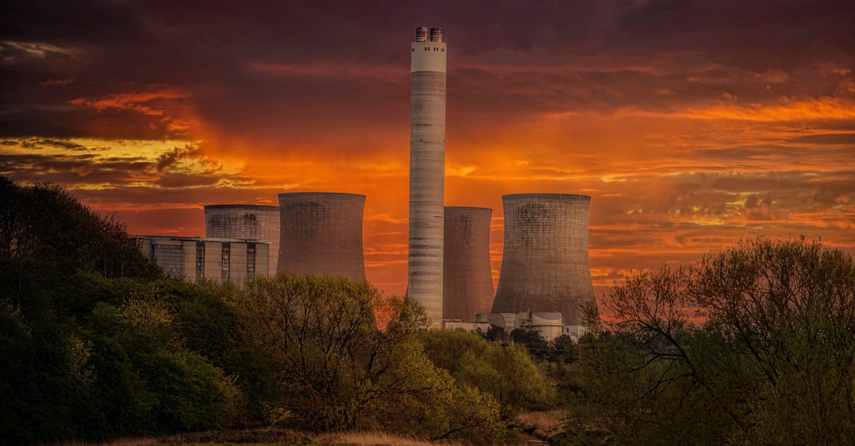 simcity nuclear meltdown even at level 4+ education - White Nuclear Plant Silo Under Orange Sky at Sunset