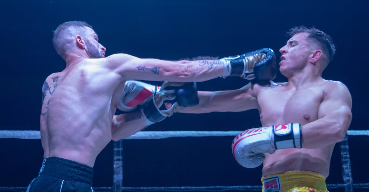 Skipping The Kayran fight - Man in Black Shorts and Black and White Nike Basketball Shoes