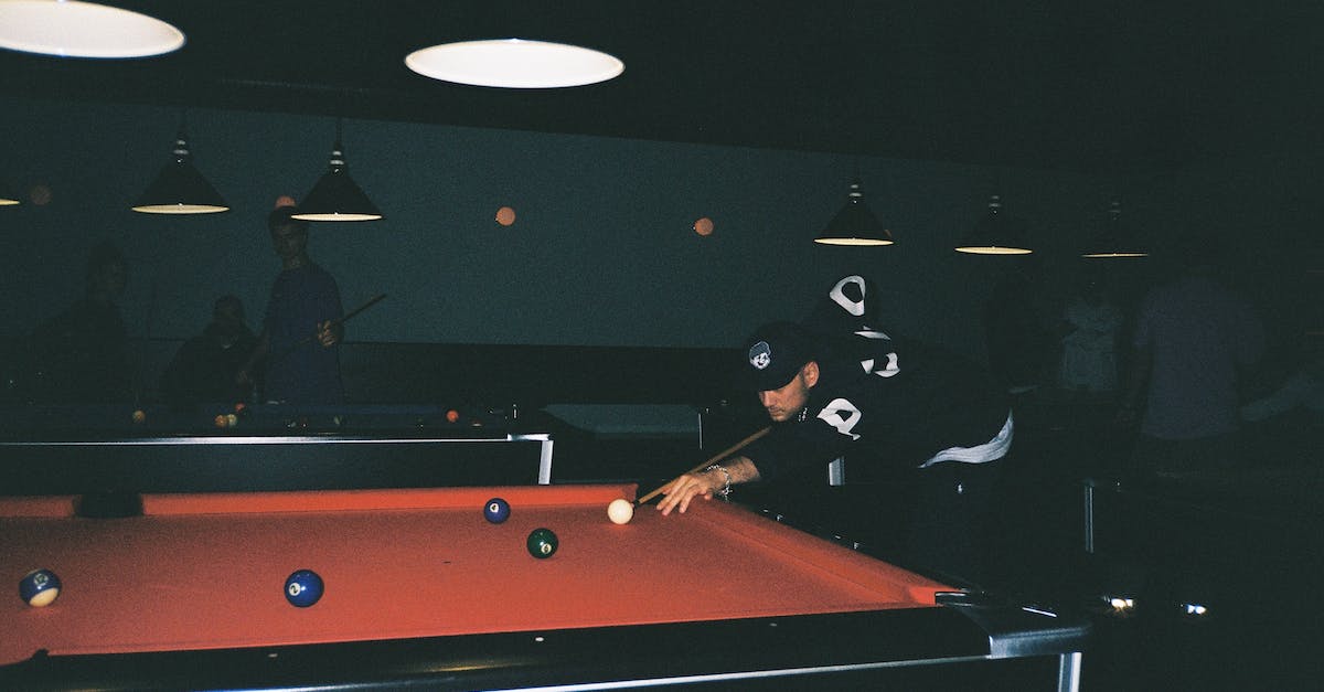 Skylander Swap Force Woodborrow pool - Man in Black Jacket and Cap Playing Billiards