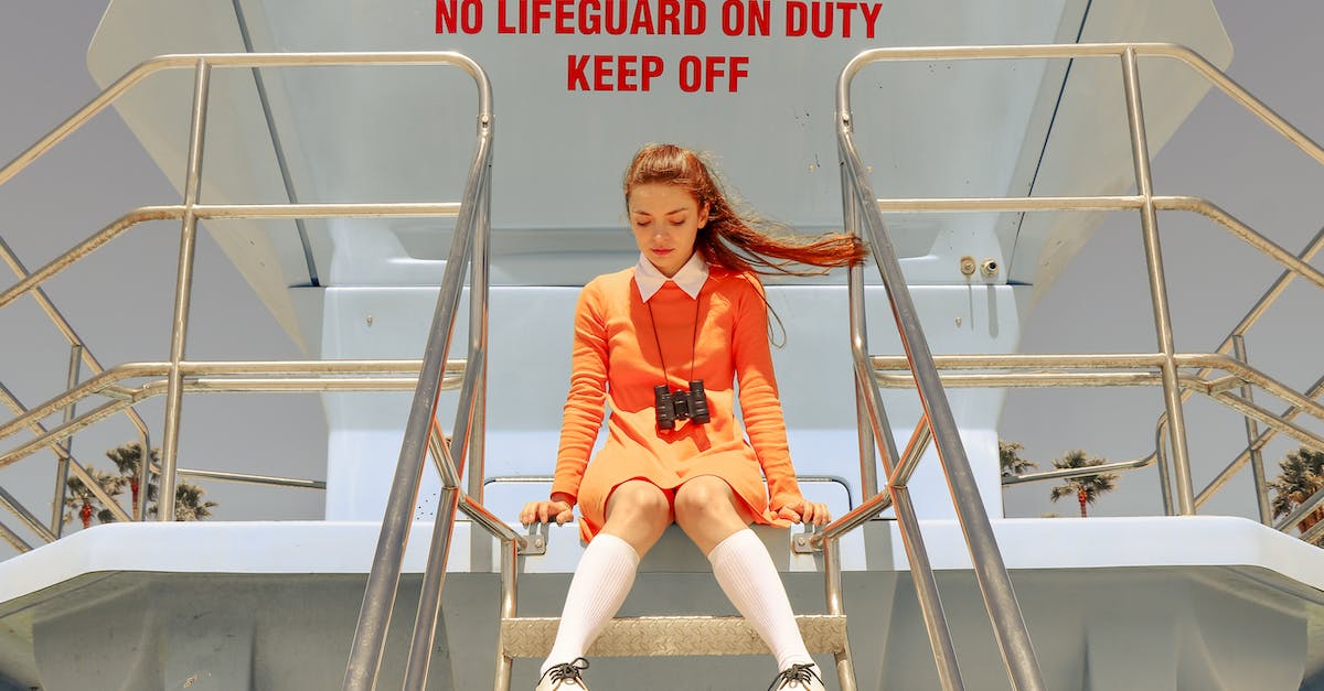 Skylander Swap Force Woodborrow pool - Woman in Orange Dress Sitting on Top of Diving Tower