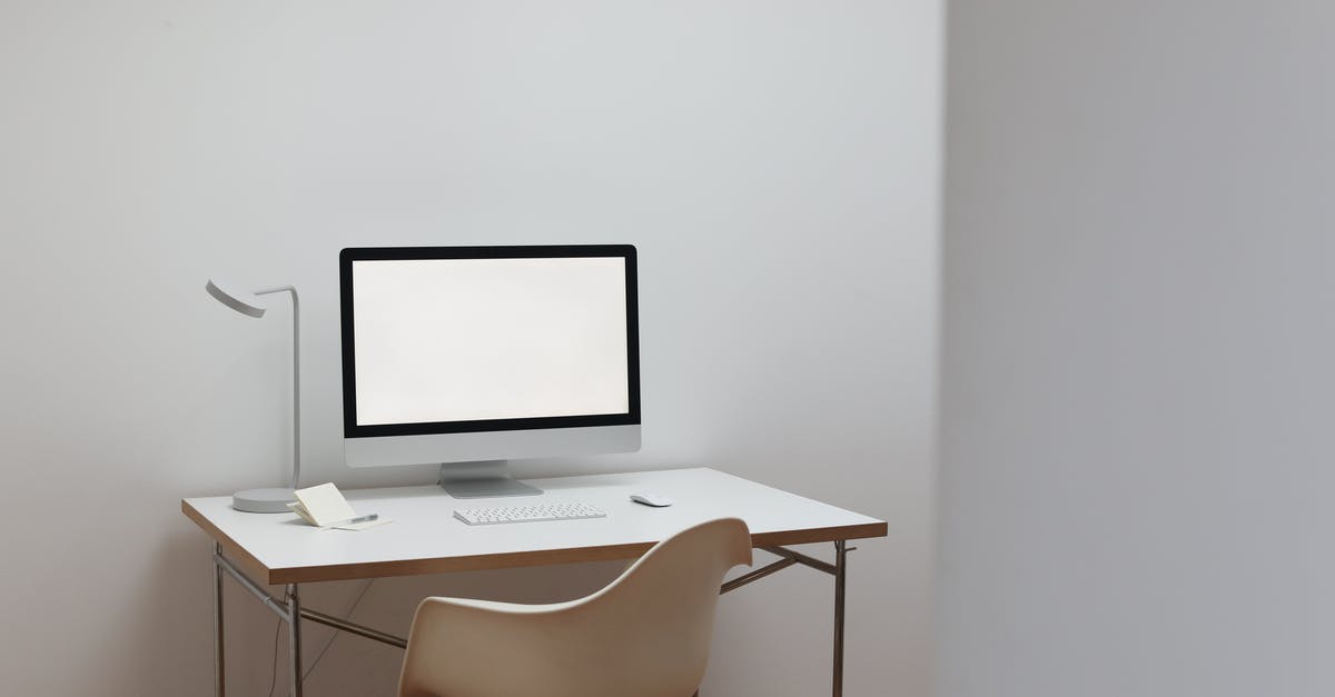 Skyrim on new PC - Modern workplace with computer and notepad