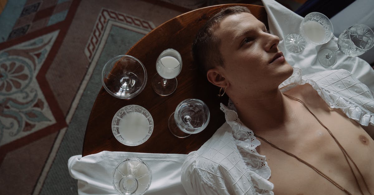 Skyrim vampirism [duplicate] - Woman in White Dress Shirt Sitting on Chair