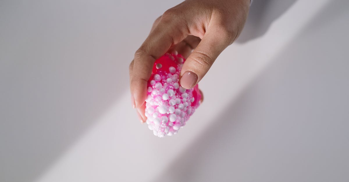 slime won't spawn [closed] - Close-Up Shot of a Person Holding a Pink Slime