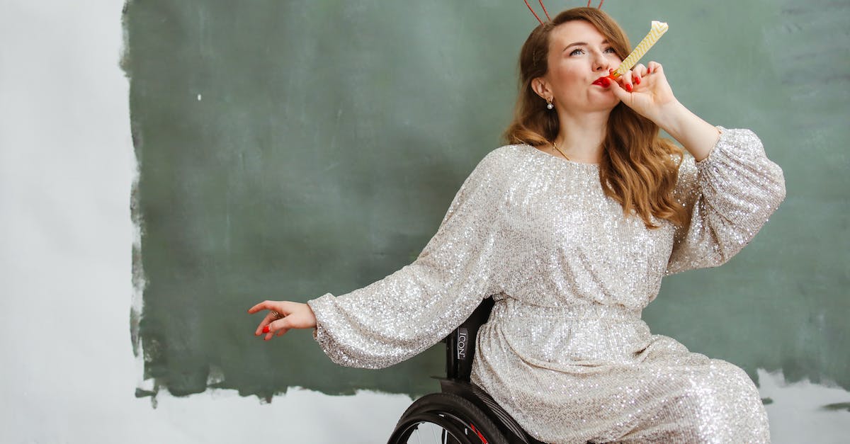 Snow Biome in Dungeon - Woman in White and Black Long Sleeve Shirt Sitting on Wheelchair Snow Biome in Dungeon - Woman in White and Black Long Sleeve Shirt Sitting on Wheelchair