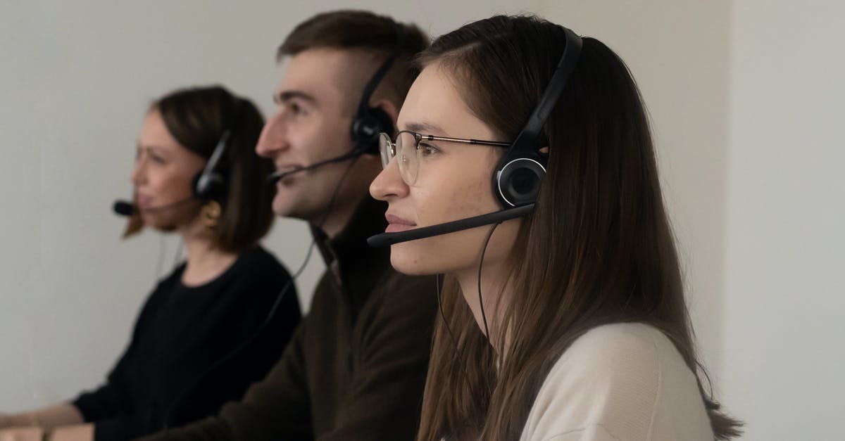 Sound doesn't work in Call of Juarez Gunslinger, under wine - Side view of young positive operators in casual outfit with headphones with microphone in light workplace Sound doesn't work in Call of Juarez Gunslinger, under wine - Side view of young positive operators in casual outfit with headphones with microphone in light workplace