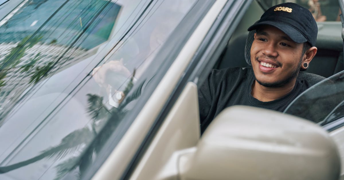 sourcebans.smx Database failure: Could not find driver "mysql" - Man in Black Knit Cap Sitting on Car Seat