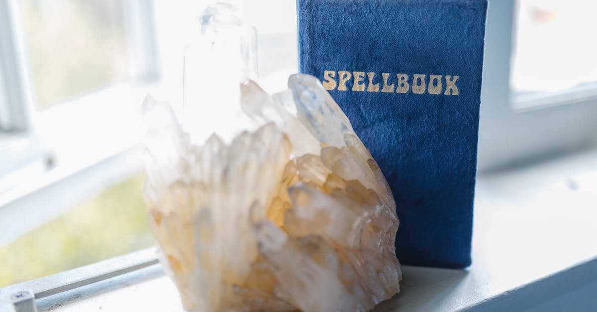 Spellbook Codes? - A Spell Book and Gem Stone on the Window Seal