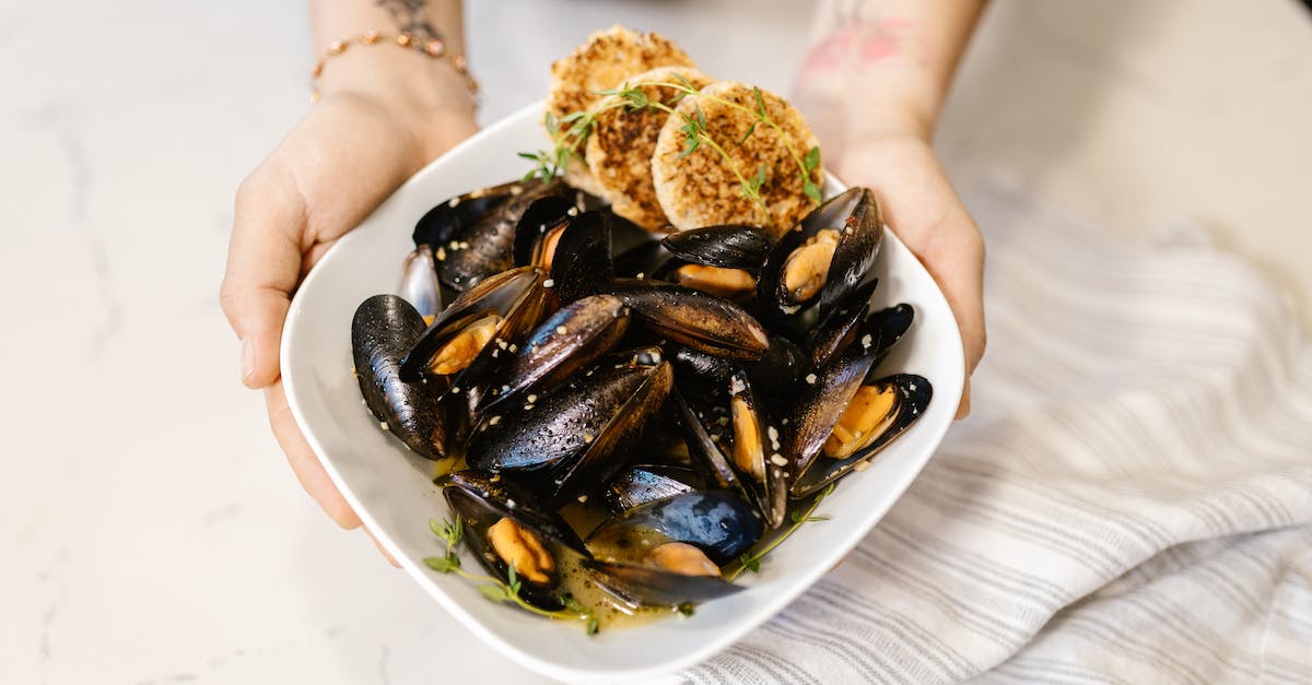 Spells that are based on Windwalk - Hands Holding Oyster Based Gourmet Dish in White Plate