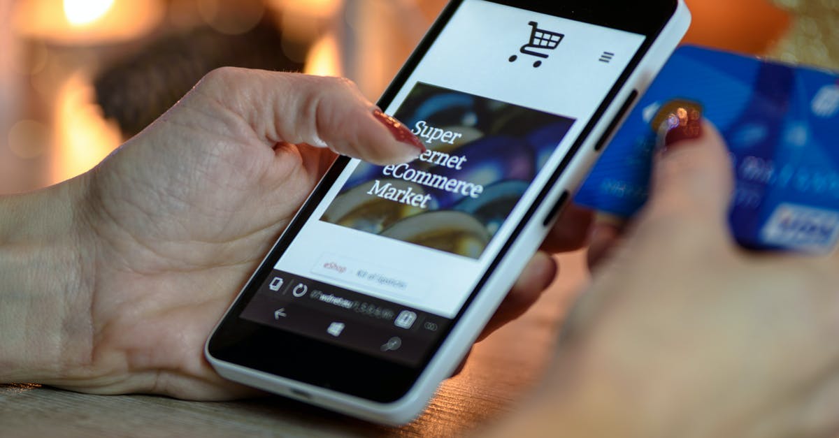 SRCDS not receiving connections on the public web - Person Using Black And White Smartphone and Holding Blue Card SRCDS not receiving connections on the public web - Person Using Black And White Smartphone and Holding Blue Card