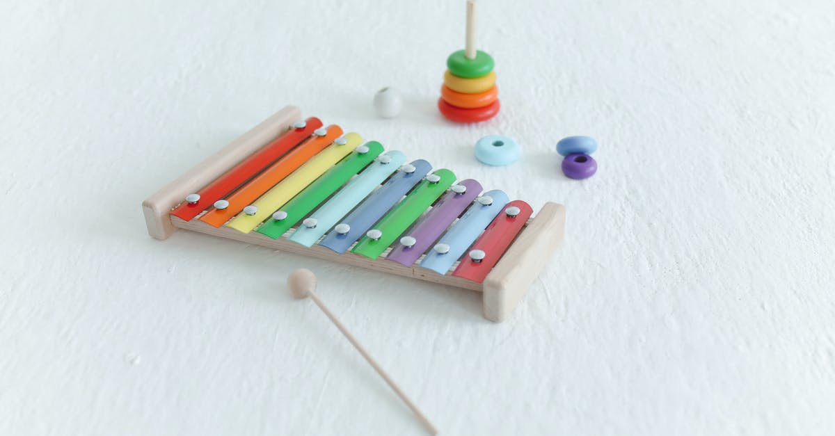 Stacking attribute modifiers - Developmental Toys on White Surface