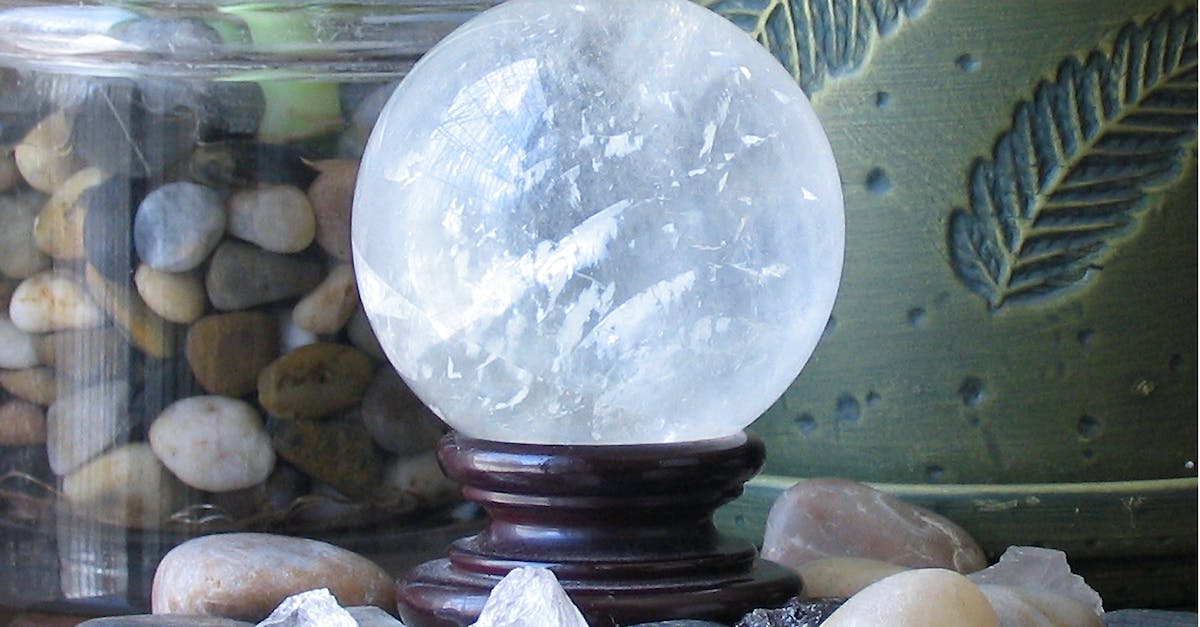 Standard vs Expert Sphere Grid - Clear Glass Ball on Brown Wooden Stand