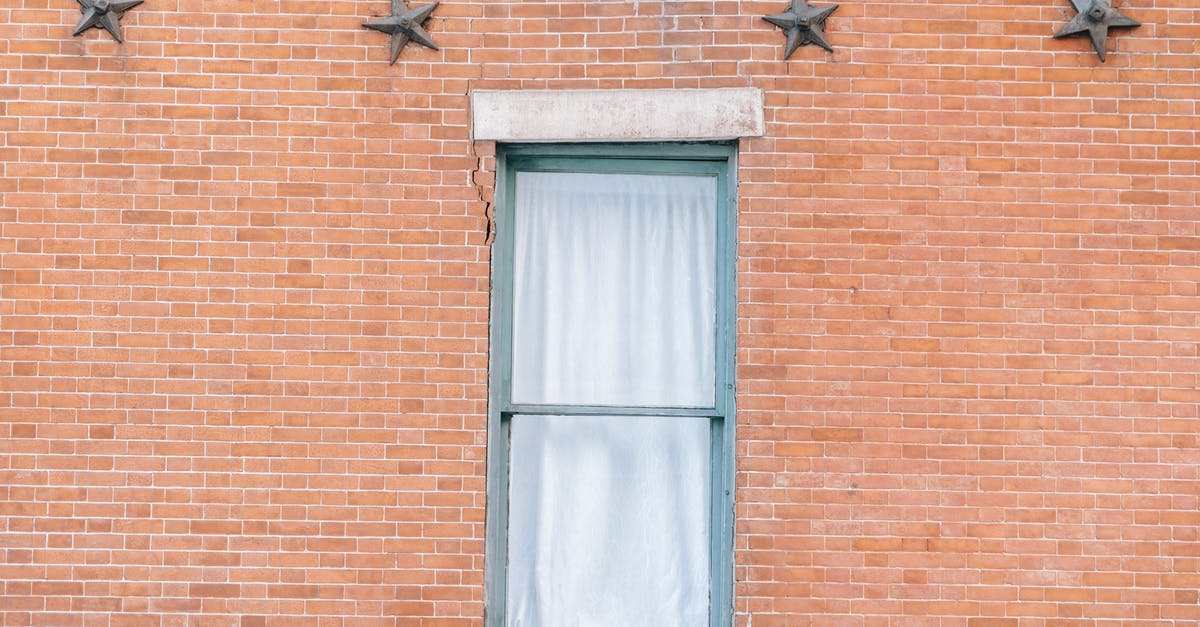 Star Wars: Galactic Battlegrounds/Age of Empires BSOD Windows 7 32-bit - Exterior of aged red brick building with curtained window and star shaped decoration Star Wars: Galactic Battlegrounds/Age of Empires BSOD Windows 7 32-bit - Exterior of aged red brick building with curtained window and star shaped decoration