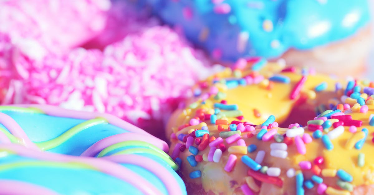 Stardust and Candy limit - Closeup Photo of Doughnuts