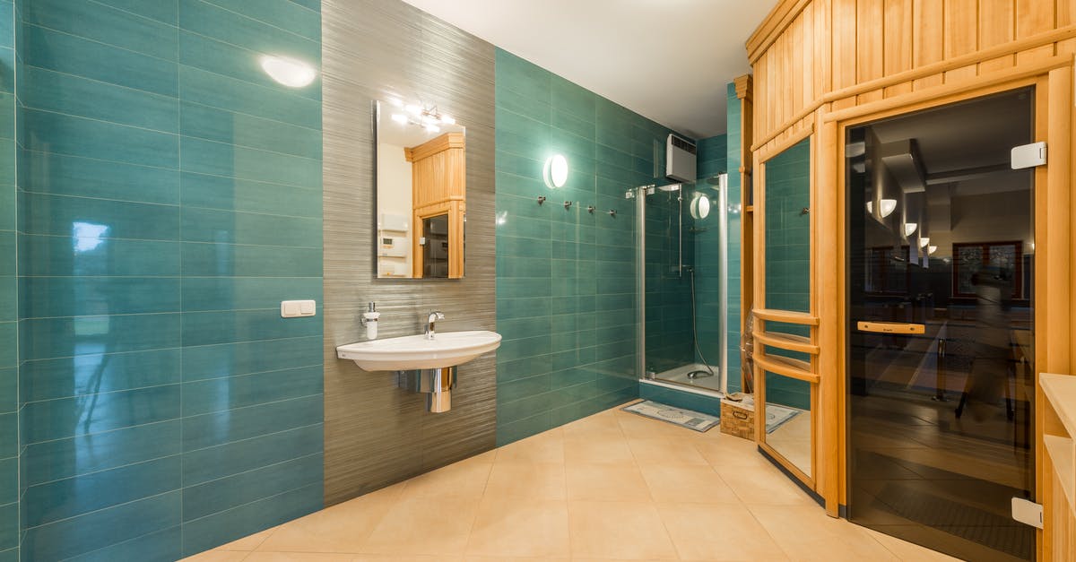 Steam Error loading Fallout: New Vegas - Interior of light shower room with glass cabin and sink and wooden entrance to sauna room with glass doorway