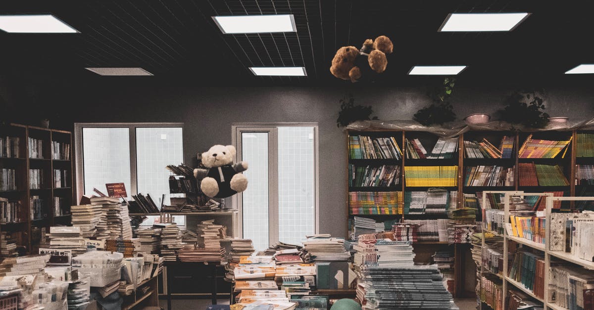 Storing books in the Arcaneum library - Photo of Pile of Books Storing books in the Arcaneum library - Photo of Pile of Books