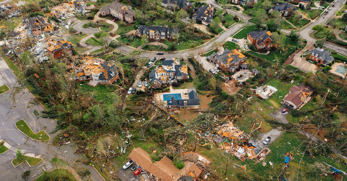 Storm Crow 'fiery ball' damage - Dramatic view of village houses damaged by thunderstorm