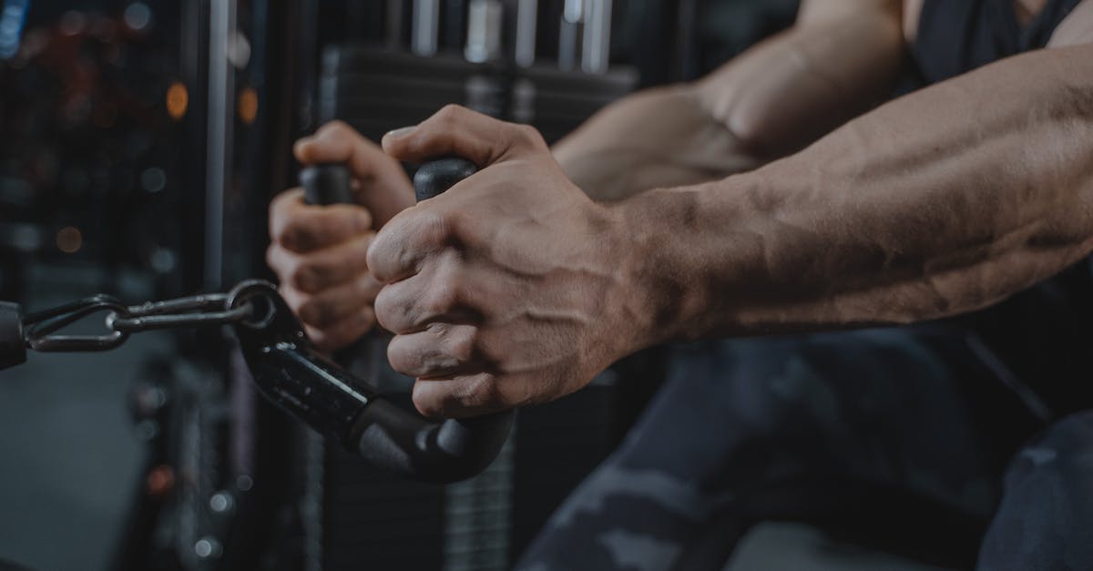 Strength difference in neutral camps - Person Holding Black Metal Bar