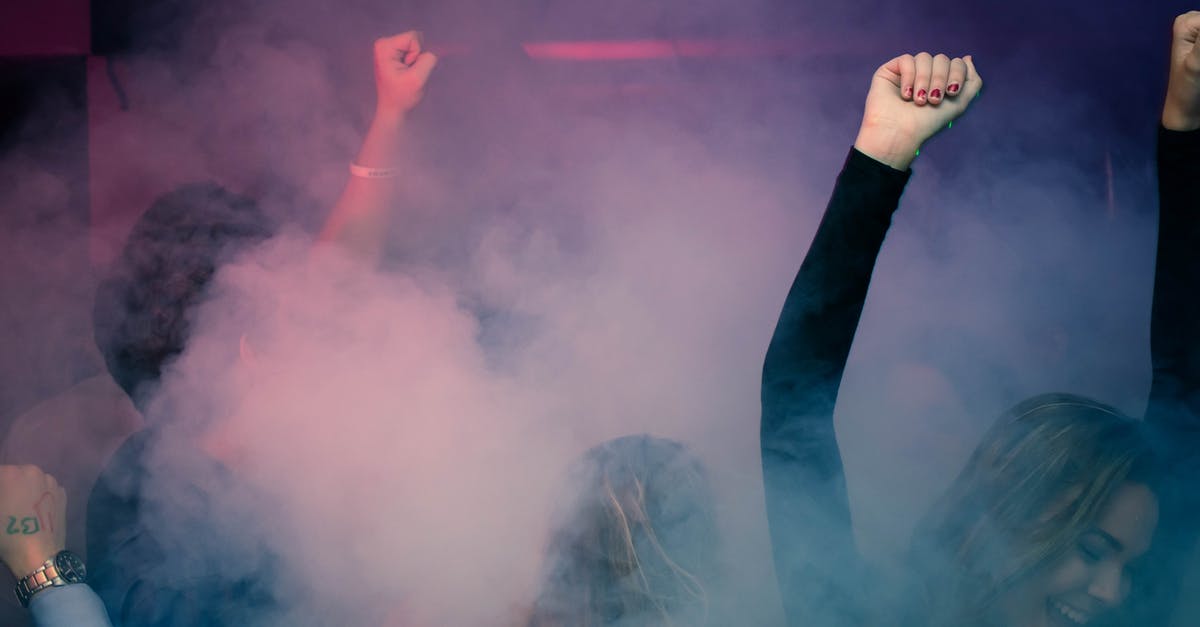 Stuck at Lady Boyle's last party - Woman Wearing Black Long-sleeved Shirt Dancing With Smoke