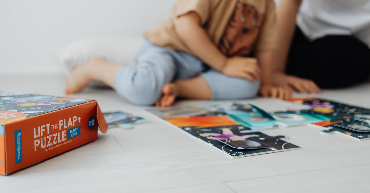 Stuck on last puzzle of level 7 - Close-up of Child Sitting on Floor Playing Game Stuck on last puzzle of level 7 - Close-up of Child Sitting on Floor Playing Game