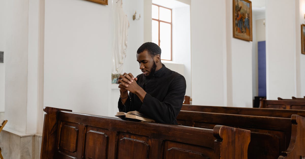 Stuck with the moth priest - Man in Black Long Sleeve Shirt Drinking from Glass