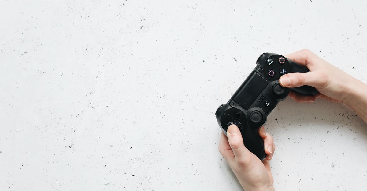Sudden FPS drop in multiple games - Person Holding Black Sony Ps 4 Game Controller Sudden FPS drop in multiple games - Person Holding Black Sony Ps 4 Game Controller