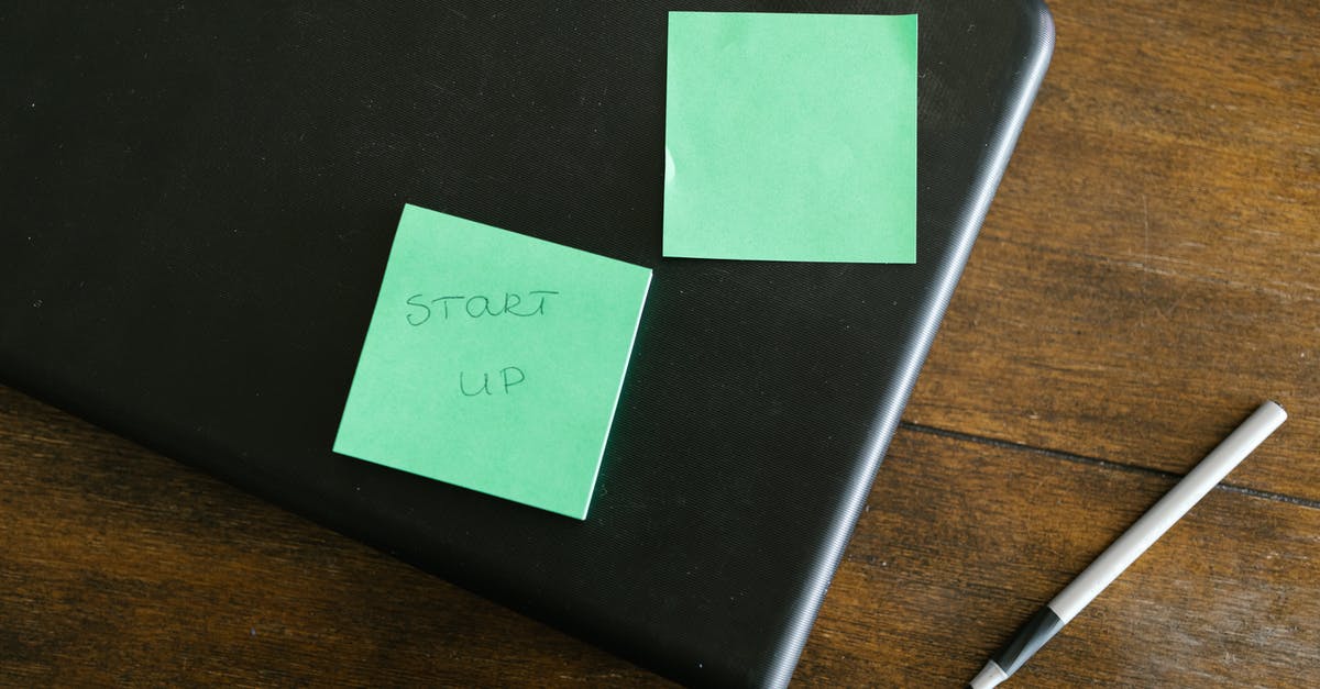 Super Mario Maker startup - Green Sticky Note on Black Laptop Computer