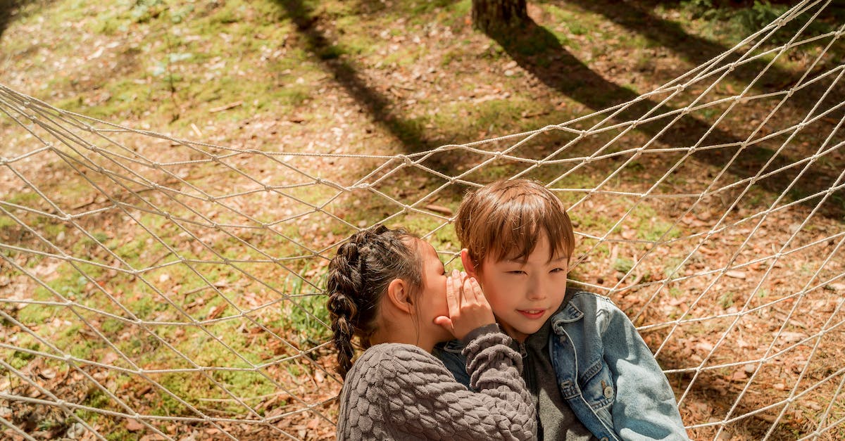 Super Secret Settings - Boy in Blue Denim Jacket Sitting on Brown Dried Leaves Super Secret Settings - Boy in Blue Denim Jacket Sitting on Brown Dried Leaves