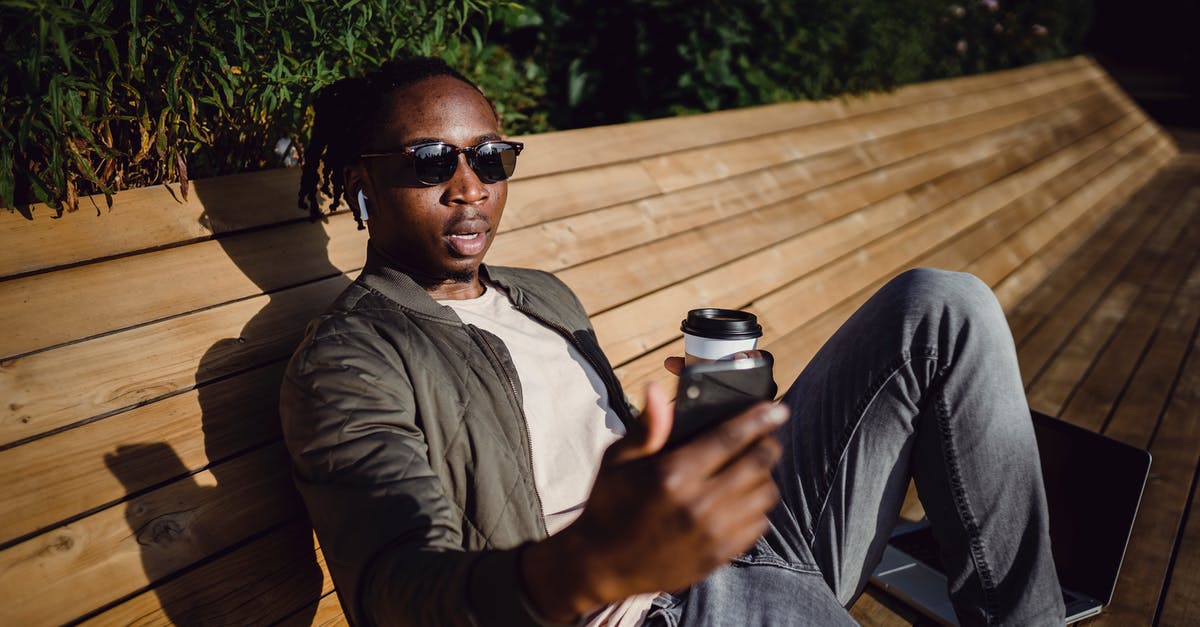 Suspiciously dying in one shot in online multiplayer Halo - Young black man taking selfie on bench in park Suspiciously dying in one shot in online multiplayer Halo - Young black man taking selfie on bench in park