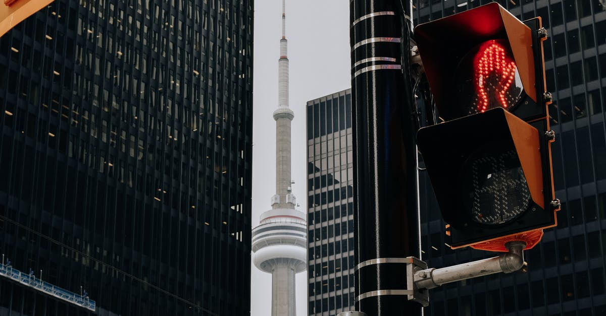 Swapping decks between versions of DOPW - Traffic light with red color and TV tower between skyscrapers Swapping decks between versions of DOPW - Traffic light with red color and TV tower between skyscrapers
