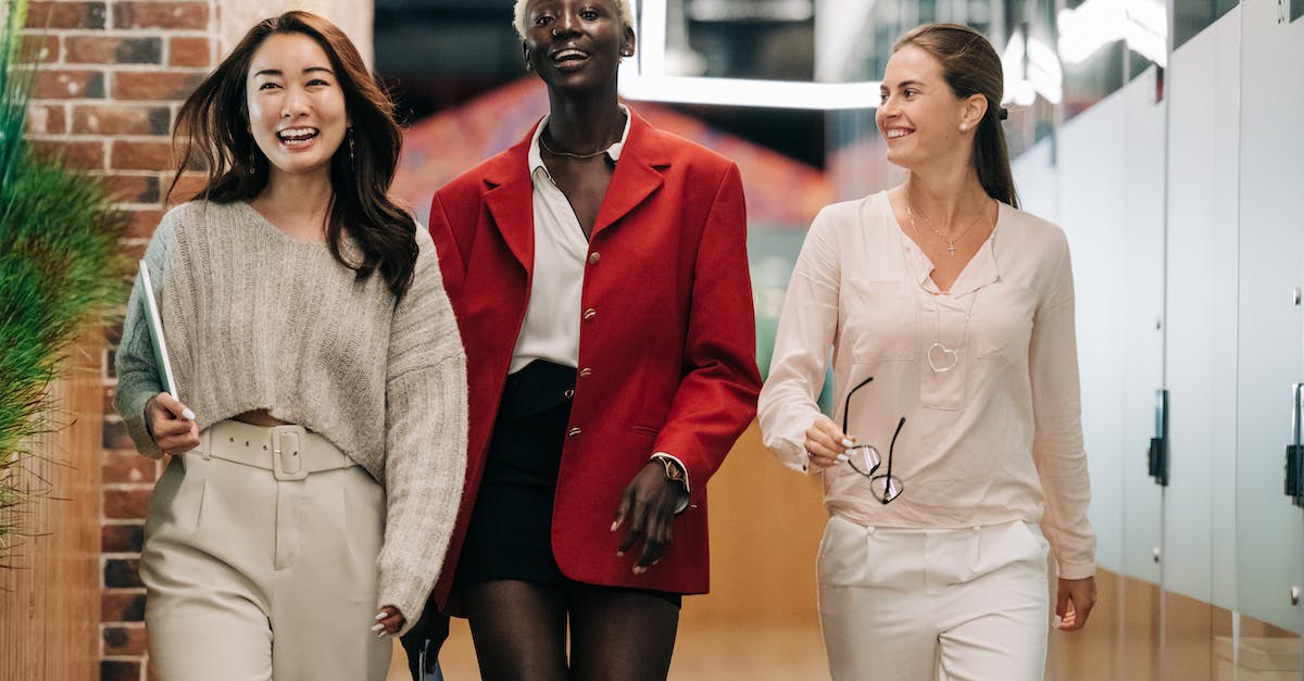 Switching Grand Company - Successful multiethnic business colleagues in modern office