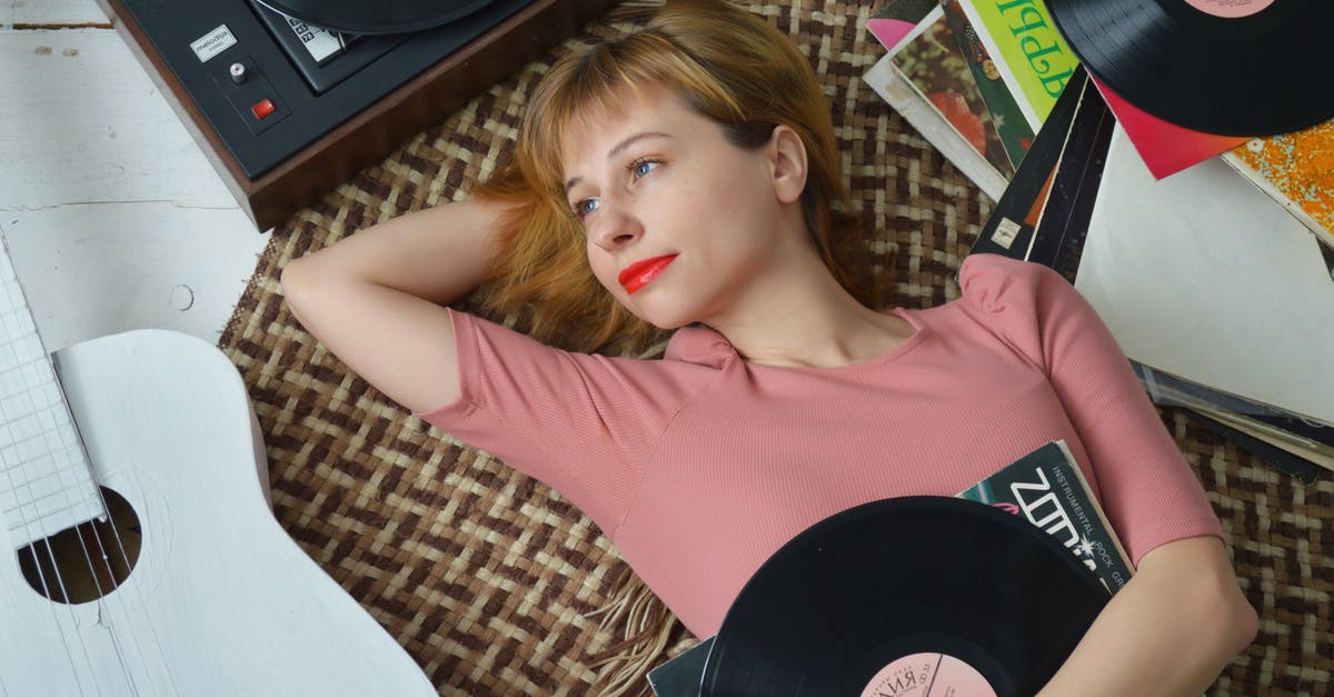 Teleport a player away from certain entities? - Relaxed woman listening to vinyl player and lying on floor