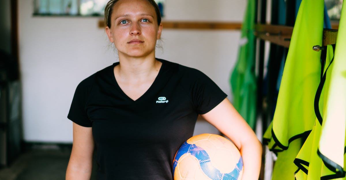 Teleport a player to face an entity? - Woman in Black V Neck T-shirt Holding Yellow and Blue Soccer Ball Teleport a player to face an entity? - Woman in Black V Neck T-shirt Holding Yellow and Blue Soccer Ball