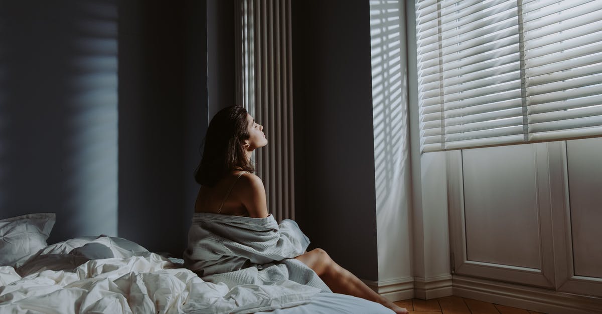Teleport an armorstand facing another armorstand with pitch (head rotation) - A Woman Sitting on Her Bed while Facing the Window