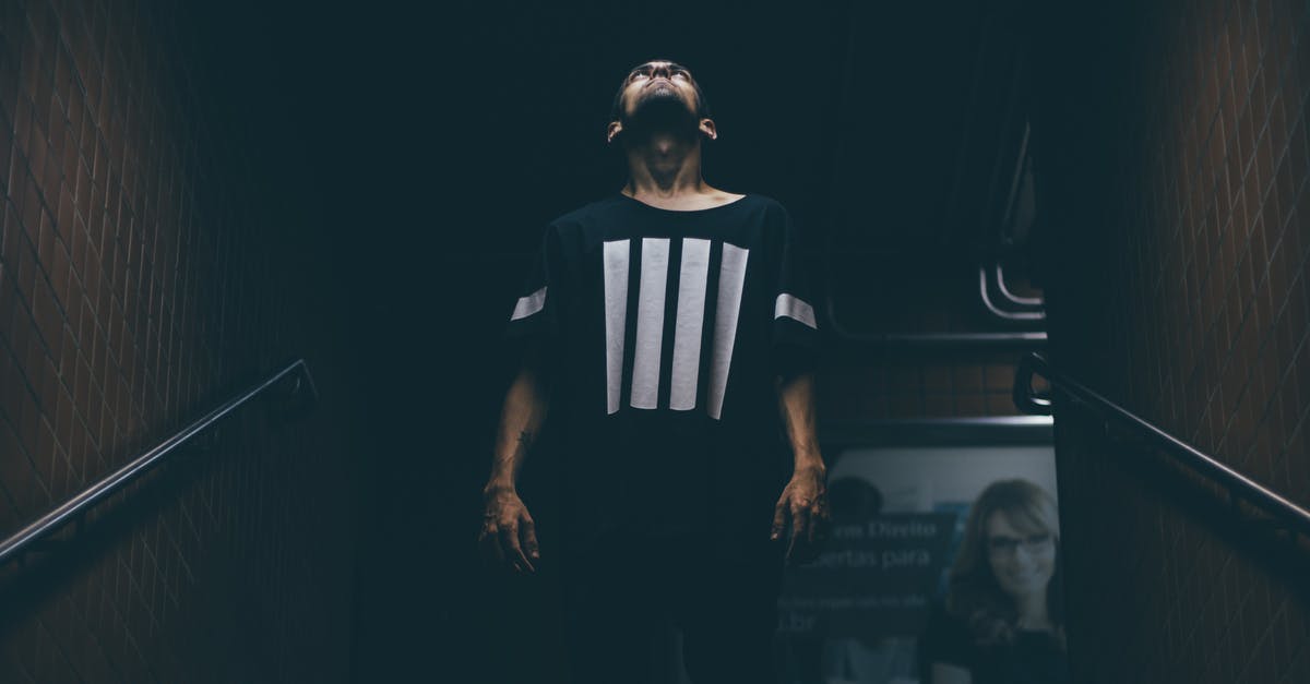 Teleporting a player from one block to another - Man Standing on Stair Case Looking Up Teleporting a player from one block to another - Man Standing on Stair Case Looking Up