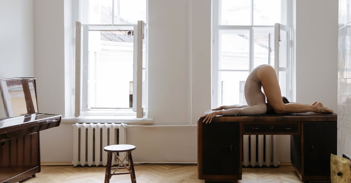 Teleporting certain people - A Person Doing Acrobat Pose on the Table