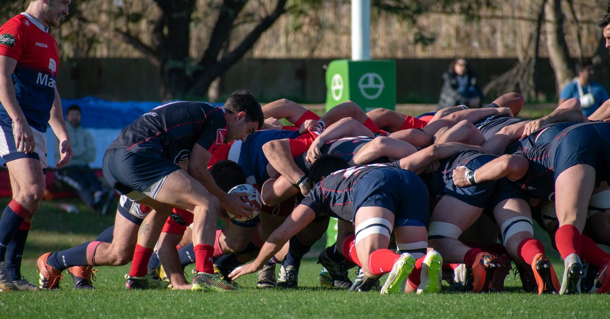 teleporting players to ender pearls? - Group of People Playing Soccer on Green Grass Field