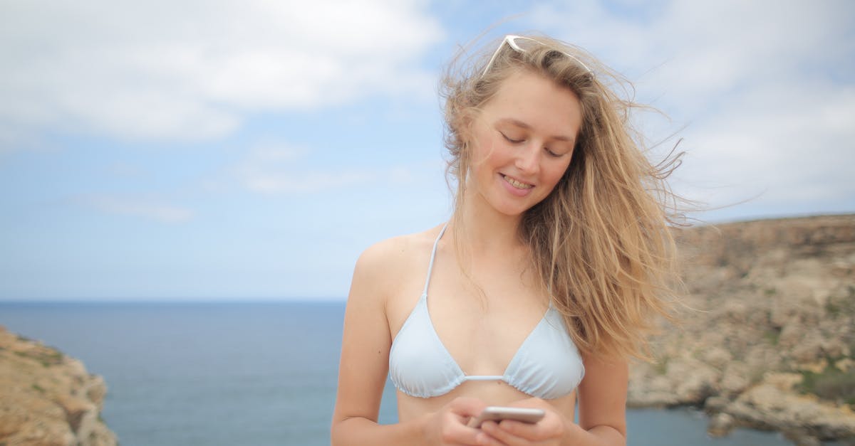 Terraria mobile key mold farm in the ocean - Woman In White Bikini Holding A Smartphone Terraria mobile key mold farm in the ocean - Woman In White Bikini Holding A Smartphone