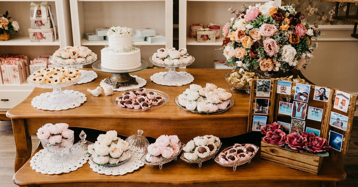 Terraria truffle [duplicate] - Assorted sweets on table with blooming flowers on wedding day
