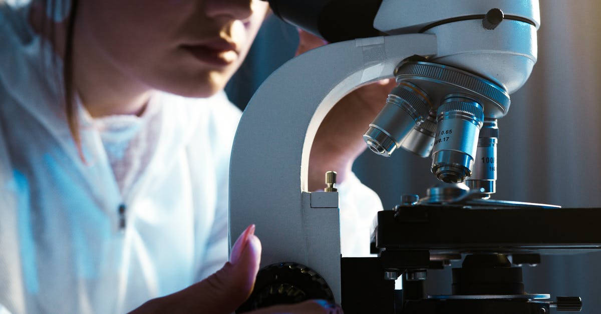Test for only for me - Person Looking Through the Microscope