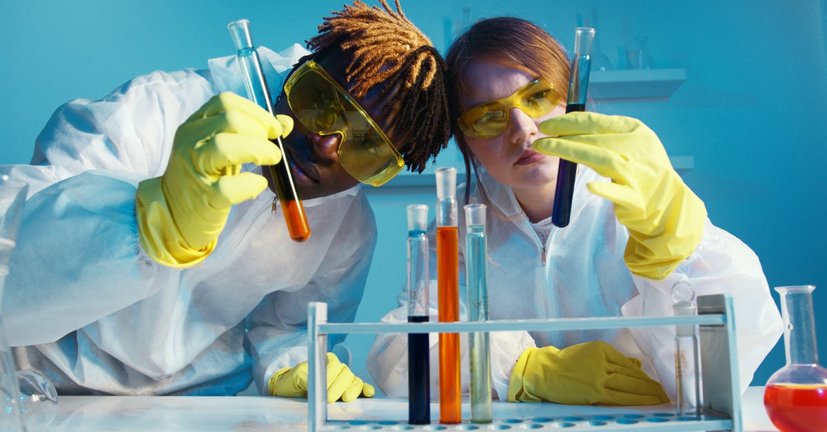 Test for only for me - A Man and a Woman Holding a Test Tube