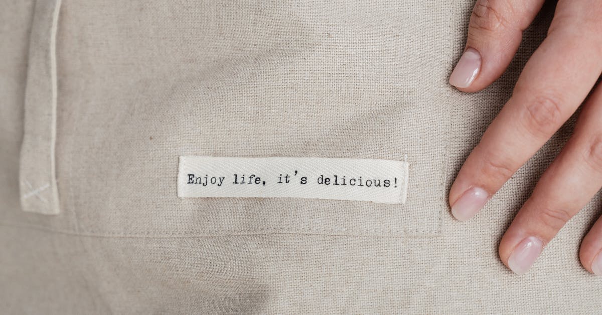 testfor wont recognize what its supposed to - Crop woman touching cloth with inscription testfor wont recognize what its supposed to - Crop woman touching cloth with inscription