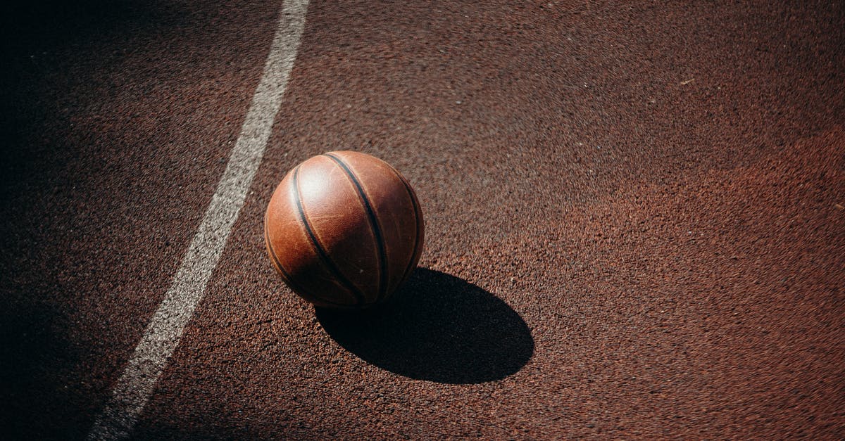 Testing if there is an entity with a objective score lower than another objective score - Brown Basketball on Brown Carpet Testing if there is an entity with a objective score lower than another objective score - Brown Basketball on Brown Carpet