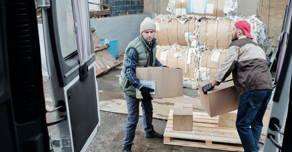 Textures not loading properly - Man in Blue Denim Jacket and Blue Denim Jeans Standing Beside Cardboard Boxes Textures not loading properly - Man in Blue Denim Jacket and Blue Denim Jeans Standing Beside Cardboard Boxes