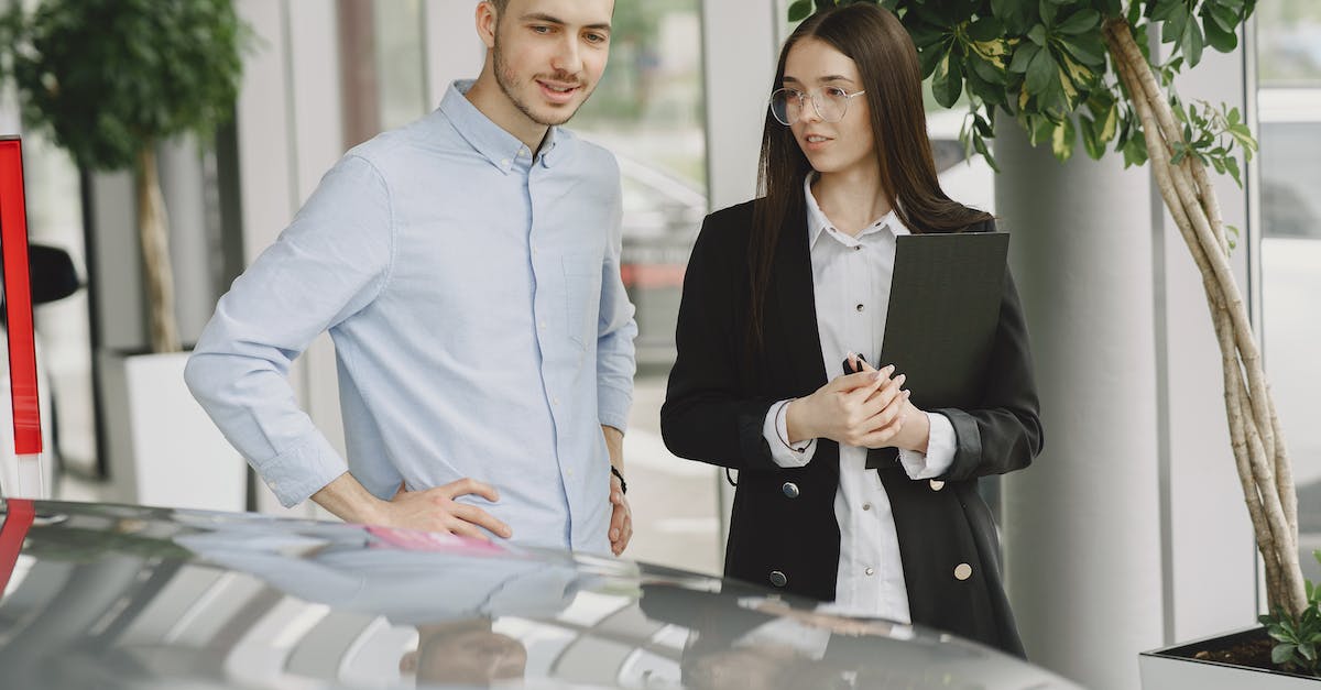 TF2- how to deal with Roof Wranglers - Man and Woman Looking at a Car