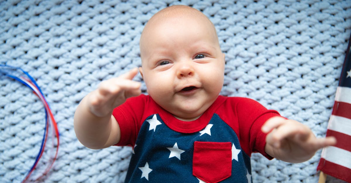 Thaumometer on bed - Baby in Red and White Crew Neck T-shirt