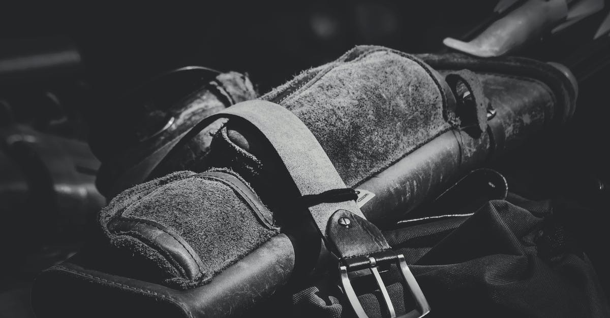 The capacity of a leather Quiver - Leather Garrison Belt Grayscale Photo