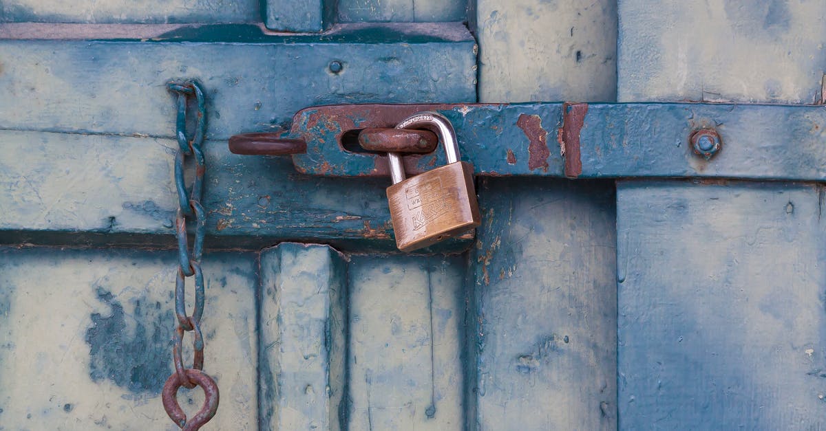 The first "staff only" door is locked - how to progress? - Gold Padlock Locking Door